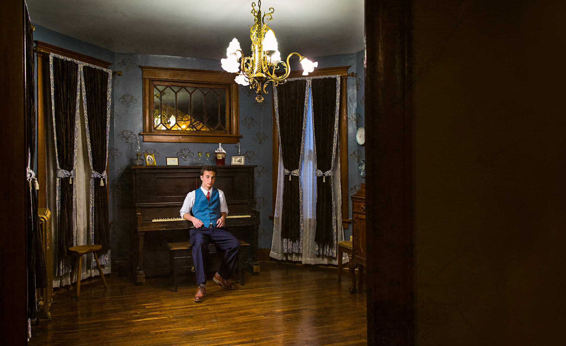 man in piano room