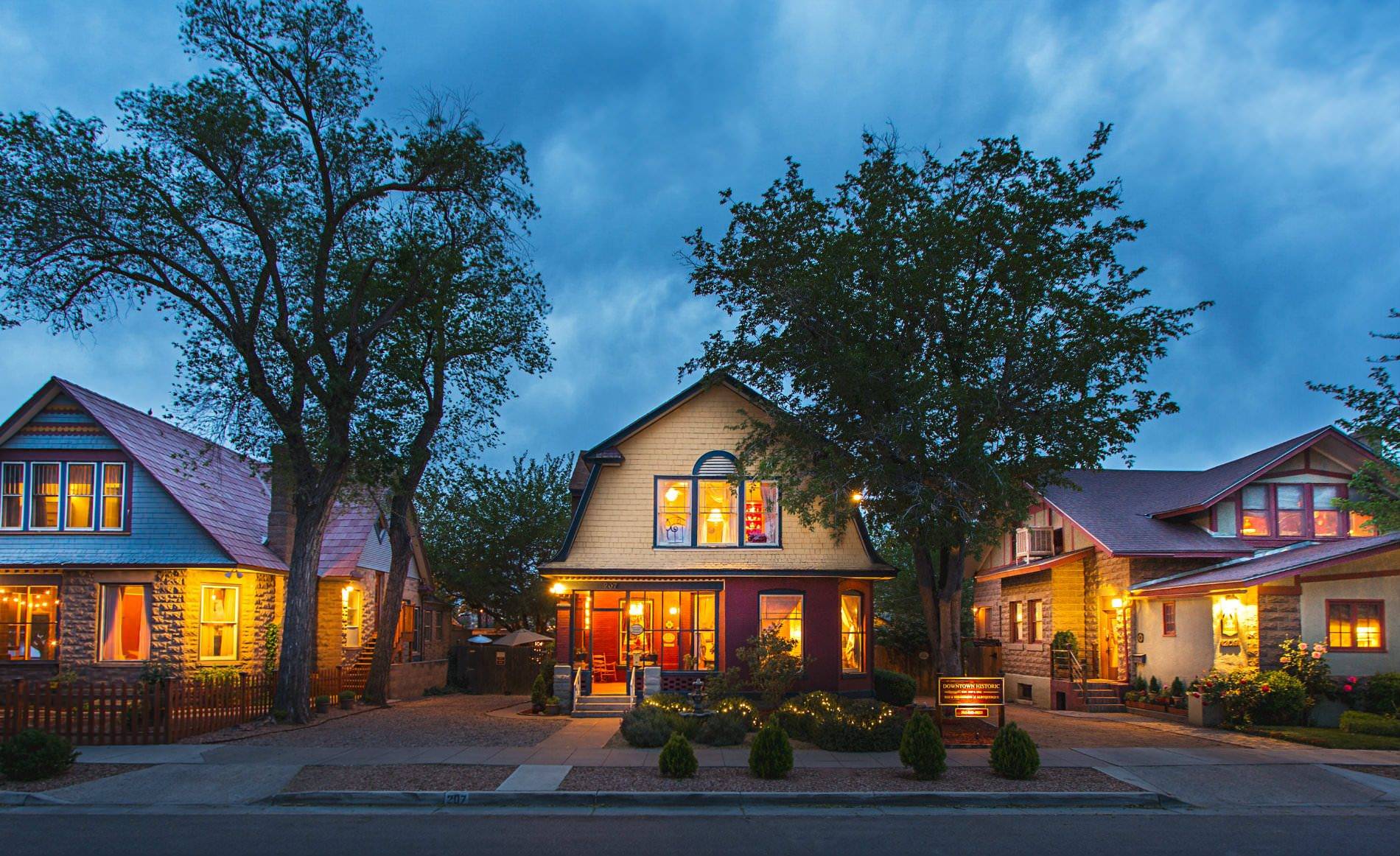 Exterior view of property and neighboring buildings. 