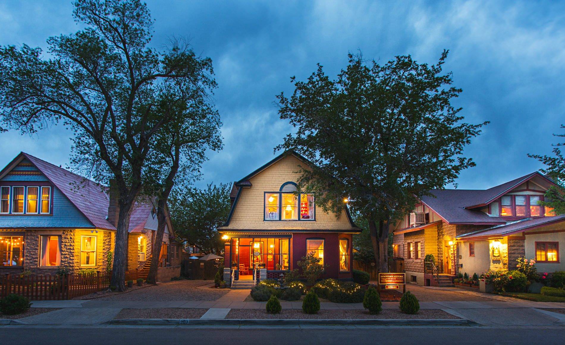 Exterior view of property and neighboring buildings. 